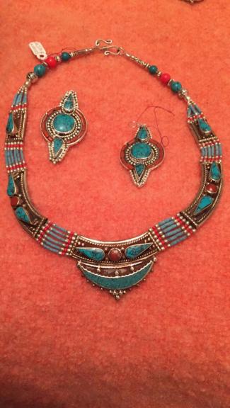 Silver, turquoise, coral and lapis necklaces .